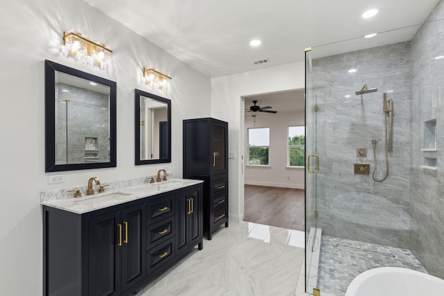 bathroom with visible vents, a sink, double vanity, and a shower stall