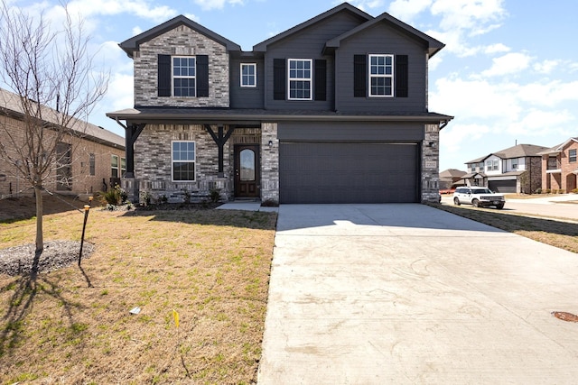 traditional-style house with an attached garage, driveway, and a front lawn