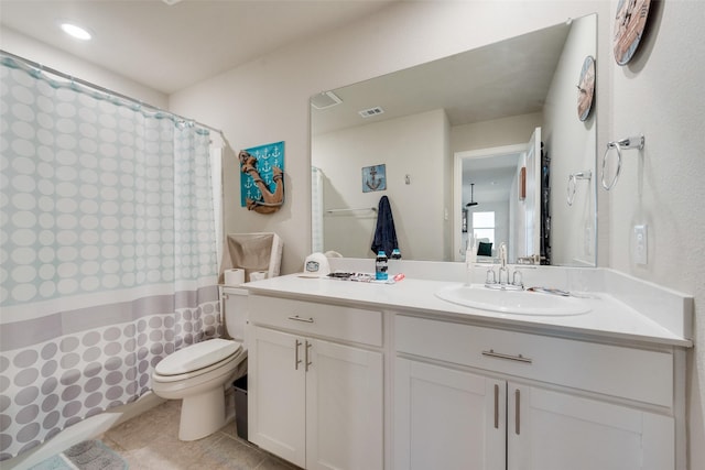 full bath with tile patterned flooring, a shower with curtain, toilet, and vanity