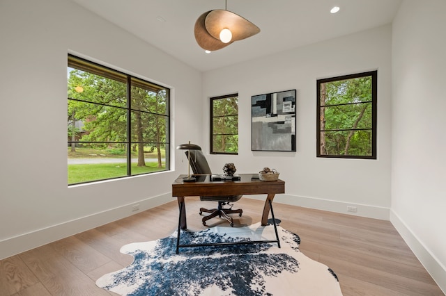 office with baseboards, recessed lighting, and light wood-style flooring