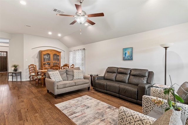 living area with visible vents, ceiling fan, dark wood-type flooring, recessed lighting, and vaulted ceiling