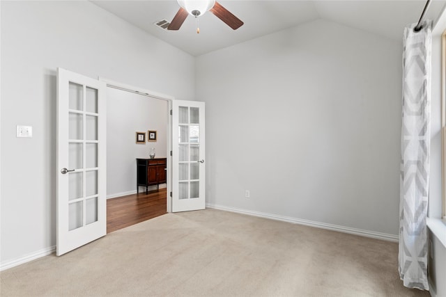 1521 Vintage Ln, Wylie, TX 75098 - unfurnished bedroom with french doors, carpet floors, vaulted ceiling, baseboards, and a ceiling fan