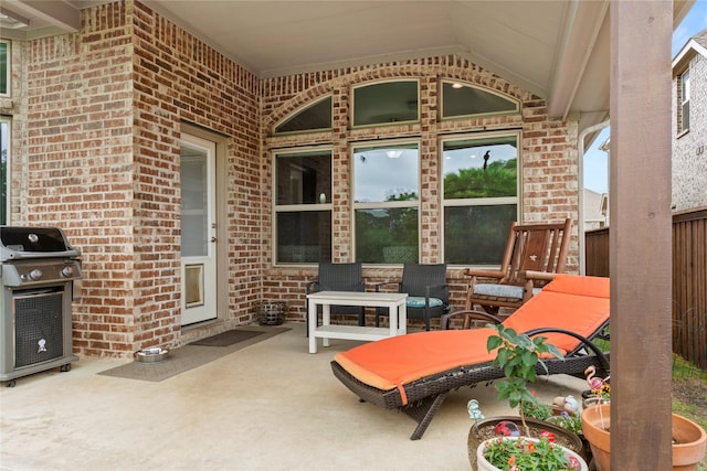 view of patio with outdoor lounge area and a grill