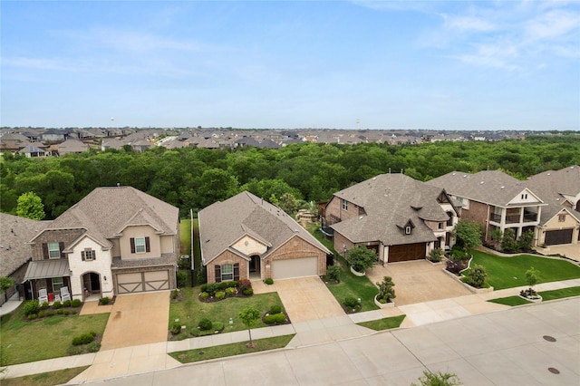 birds eye view of property with a residential view