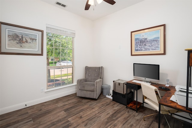 office featuring baseboards, ceiling fan, wood finished floors, and visible vents