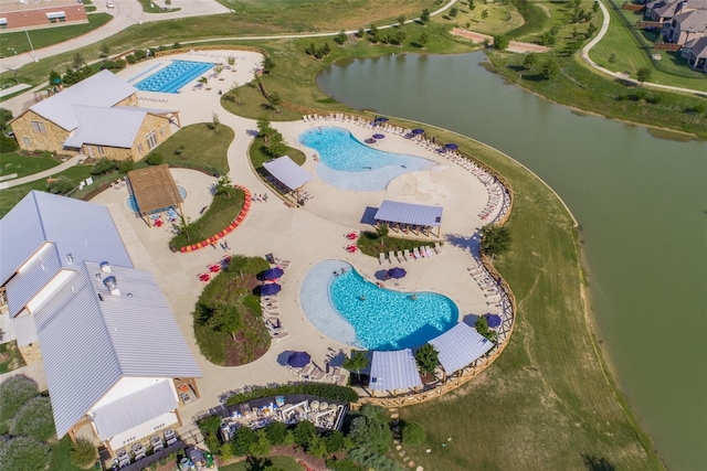 drone / aerial view featuring a water view