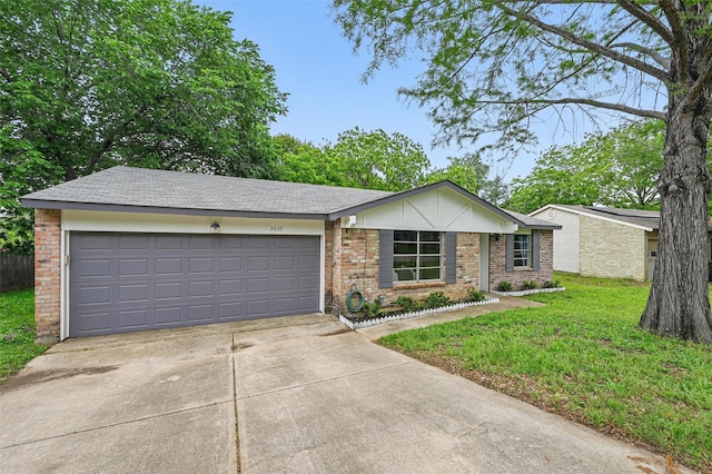 ranch-style house with brick siding, a garage, driveway, and a front yard
