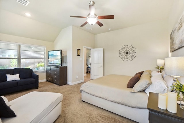 bedroom with ceiling fan, light colored carpet, baseboards, vaulted ceiling, and visible vents