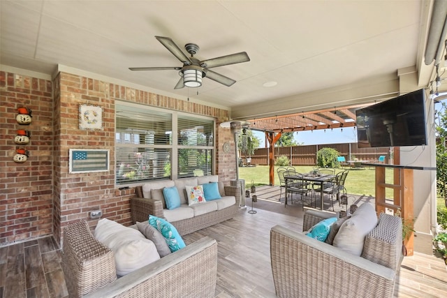 exterior space with fence, ceiling fan, an outdoor living space, and outdoor dining space