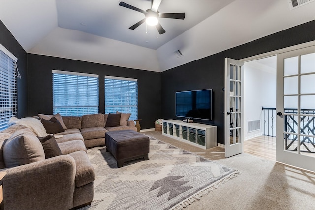 bedroom featuring carpet, vaulted ceiling, and a notable chandelier
