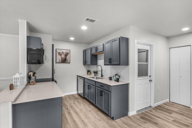 1013 Springdale Rd, Bedford, TX 76021 - kitchen featuring light wood-style floors, a sink, visible vents, and recessed lighting