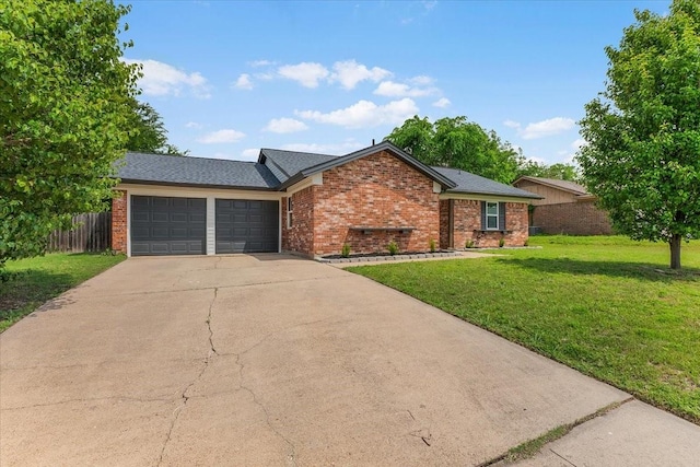 1013 Springdale Rd, Bedford, TX 76021 - single story home with driveway, a garage, brick siding, fence, and a front lawn