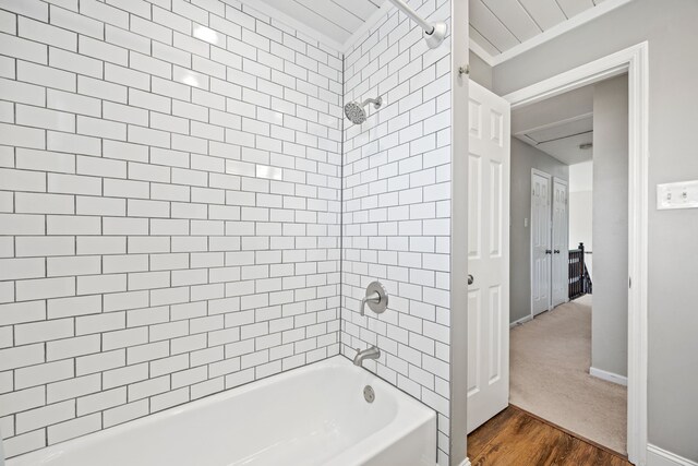 bathroom featuring tile patterned floors, a shower stall, and a bath