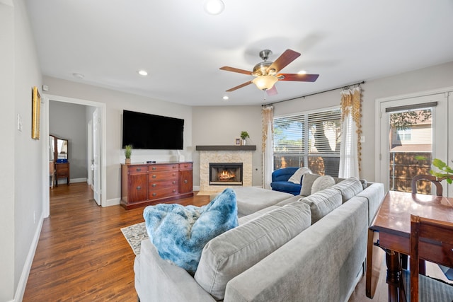 living room with a ceiling fan, baseboards, recessed lighting, wood finished floors, and visible vents