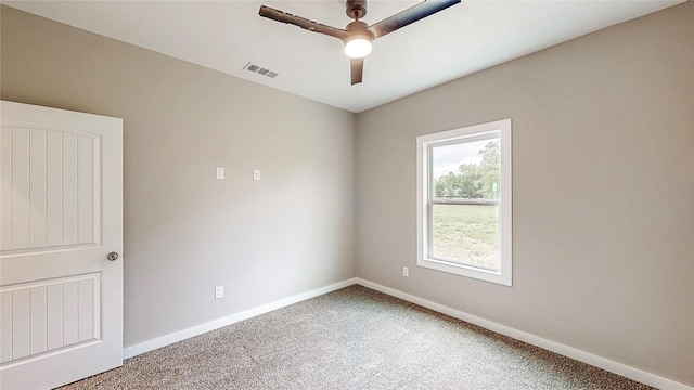 unfurnished room with light colored carpet, baseboards, and visible vents