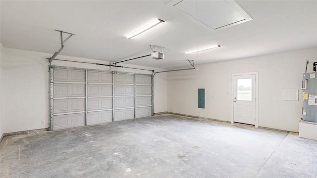 garage with a garage door opener, water heater, and electric panel