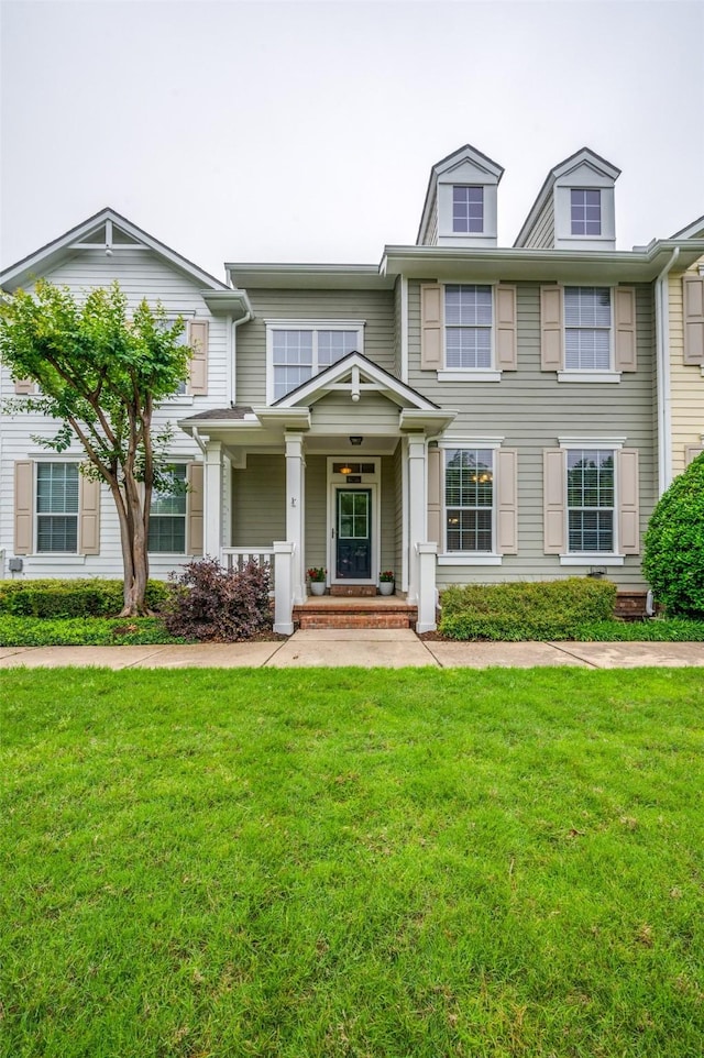 view of front of property featuring a front yard