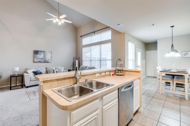 kitchen with a sink, visible vents, stainless steel dishwasher, and open floor plan