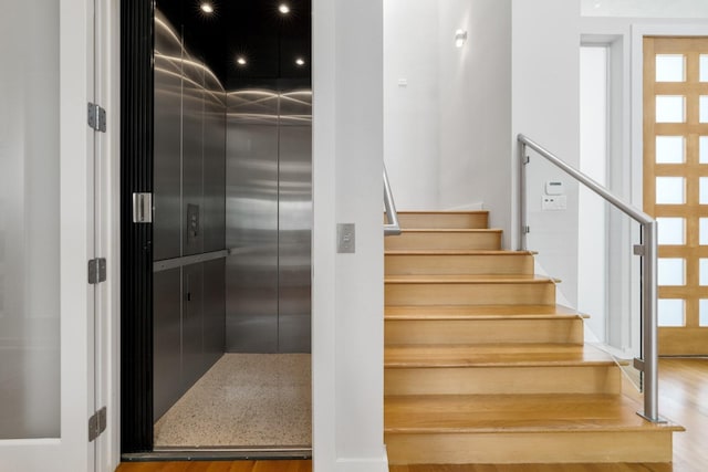 11715 Parwen Dr, Dallas, TX 75230 - staircase featuring wood finished floors