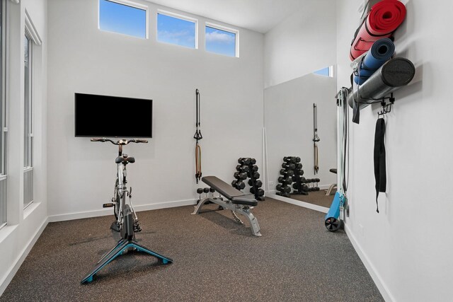 11715 Parwen Dr, Dallas, TX 75230 - exercise room with carpet floors and baseboards