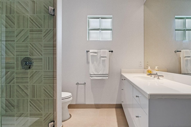 11715 Parwen Dr, Dallas, TX 75230 - full bath featuring vanity, baseboards, a stall shower, and toilet