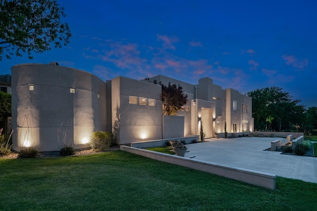 11715 Parwen Dr, Dallas, TX 75230 - view of front facade with a front yard and stucco siding