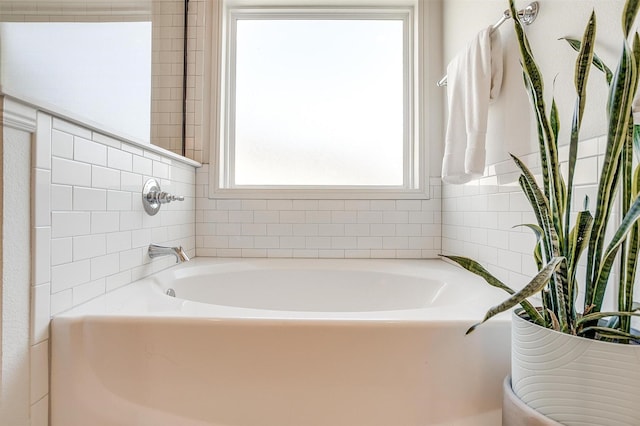 bathroom featuring a garden tub