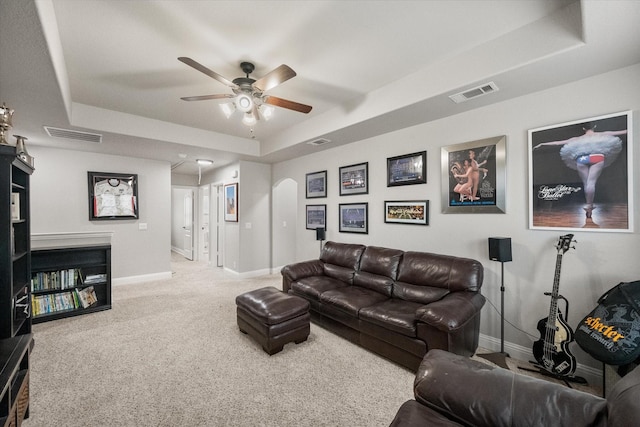 2114 Burke Dr, Princeton, TX 75407 - living room featuring baseboards, ceiling fan, a tray ceiling, and visible vents