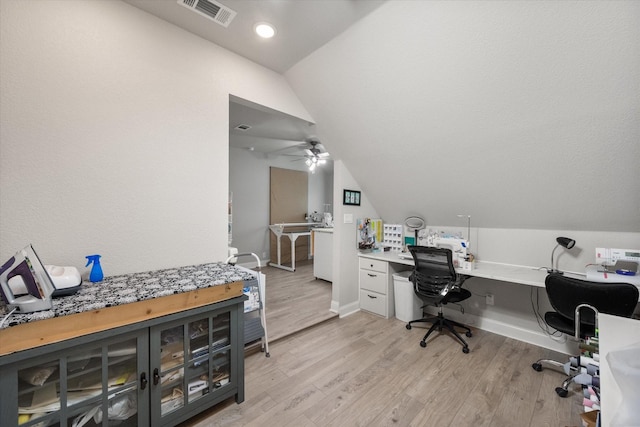2114 Burke Dr, Princeton, TX 75407 - home office featuring light wood-style floors, ceiling fan, lofted ceiling, and visible vents