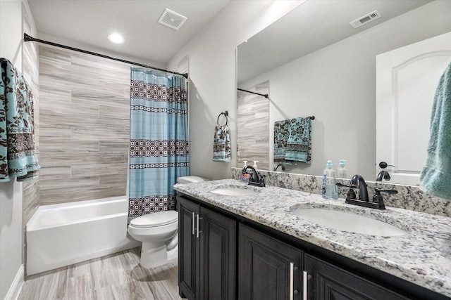2114 Burke Dr, Princeton, TX 75407 - full bathroom featuring visible vents, a sink, and toilet