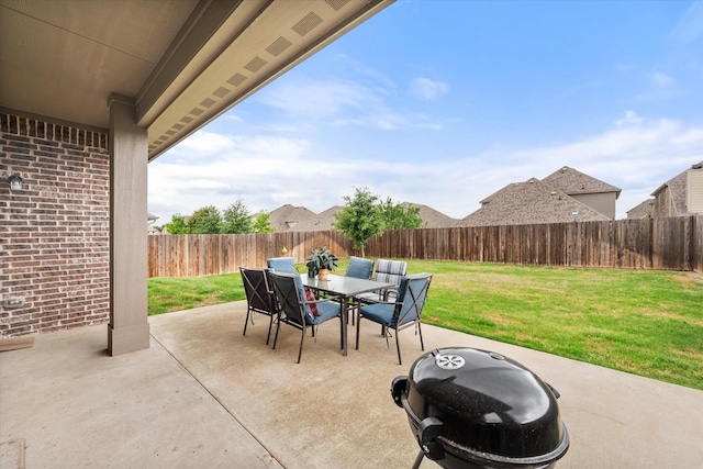 2114 Burke Dr, Princeton, TX 75407 - view of patio / terrace with outdoor dining area and a fenced backyard