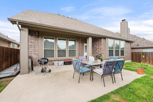 2114 Burke Dr, Princeton, TX 75407 - view of patio / terrace featuring a fenced backyard, outdoor dining space, and grilling area