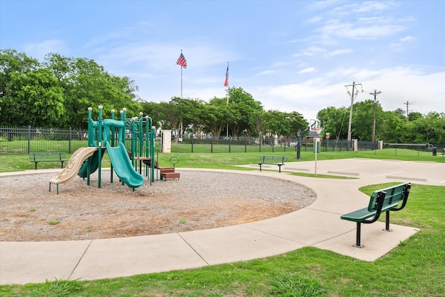 2114 Burke Dr, Princeton, TX 75407 - community jungle gym featuring a lawn and fence