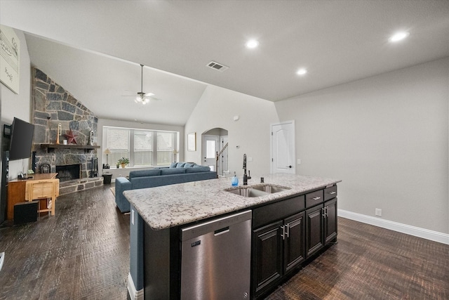 2114 Burke Dr, Princeton, TX 75407 - kitchen with a sink, a kitchen island with sink, arched walkways, stainless steel dishwasher, and visible vents
