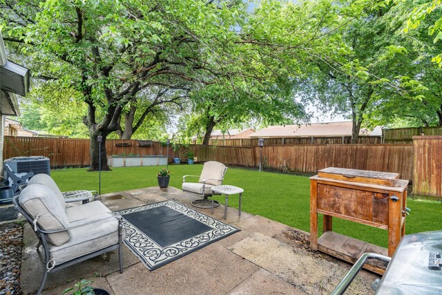 view of patio / terrace with a fenced backyard and central AC