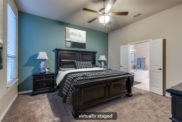 carpeted bedroom with a ceiling fan, baseboards, visible vents, and ensuite bathroom