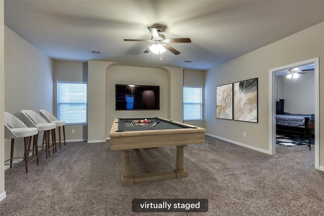 game room with baseboards, carpet, and ceiling fan