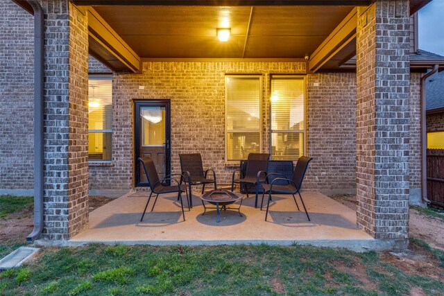 view of patio / terrace featuring a fire pit