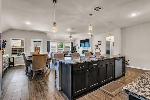 621 Hazeltine Rd, Red Oak, TX 75154 - kitchen with stainless steel dishwasher, dark wood-style flooring, visible vents, and a sink