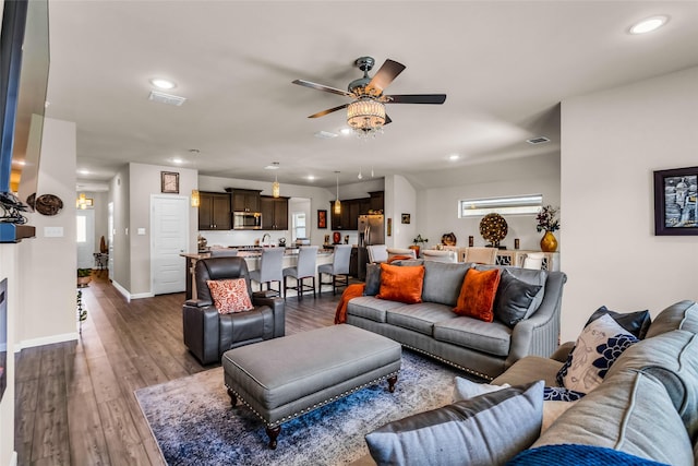 621 Hazeltine Rd, Red Oak, TX 75154 - living area featuring ceiling fan, recessed lighting, dark wood-style flooring, and baseboards