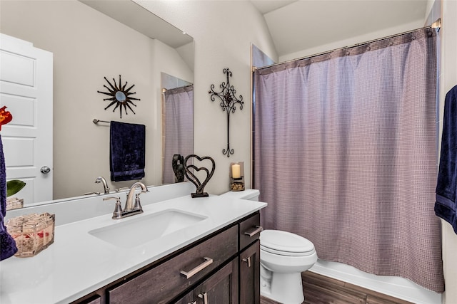 621 Hazeltine Rd, Red Oak, TX 75154 - bathroom with vanity, toilet, wood finished floors, and shower / bath combo
