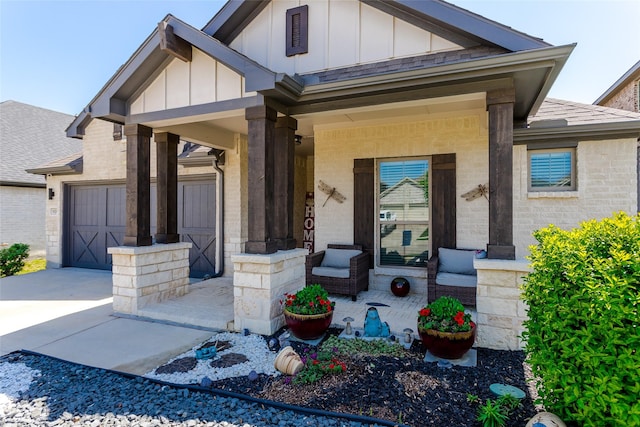 621 Hazeltine Rd, Red Oak, TX 75154 - view of front of house with board and batten siding, brick siding, concrete driveway, and covered porch