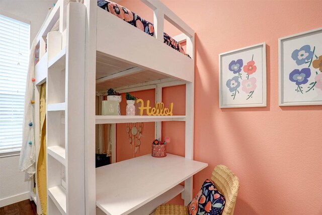 bathroom with lofted ceiling, a stall shower, a bath, wood finished floors, and decorative backsplash