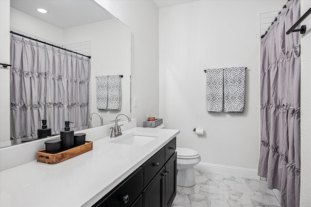 bathroom featuring baseboards, vanity, toilet, marble finish floor, and recessed lighting