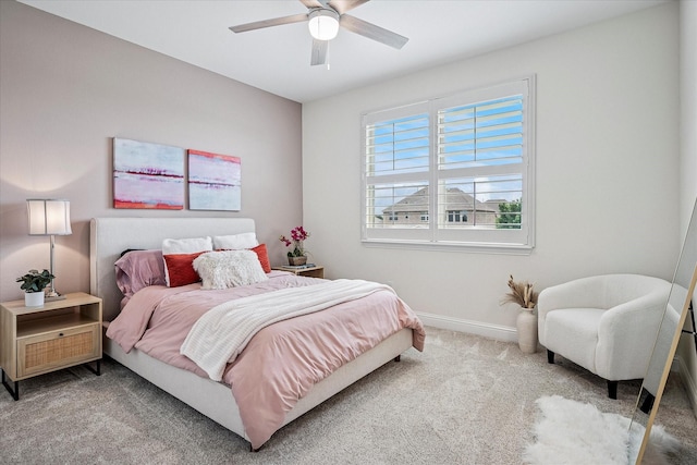 bedroom with carpet floors, baseboards, and ceiling fan