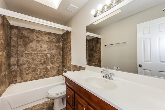 full bathroom featuring visible vents, bathing tub / shower combination, toilet, and vanity