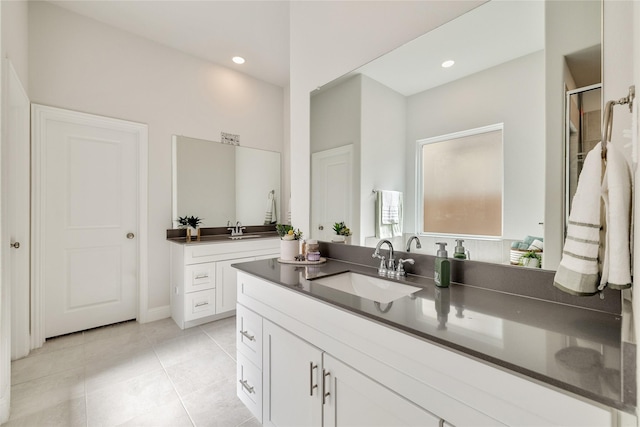full bathroom with an enclosed shower, recessed lighting, tile patterned floors, and vanity