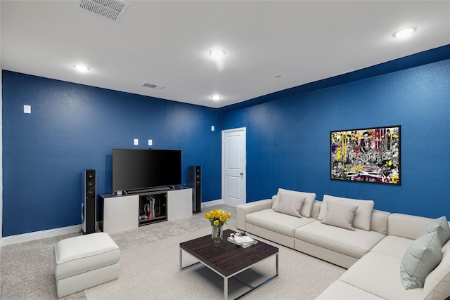 living room with carpet flooring, recessed lighting, and visible vents