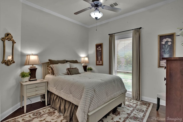 1123 Waters Edge Cir, Shreveport, LA 71106 - bedroom featuring ceiling fan, visible vents, crown molding, wood finished floors, and baseboards