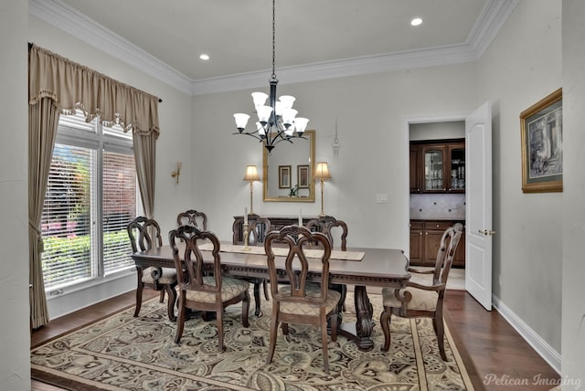 1123 Waters Edge Cir, Shreveport, LA 71106 - dining area featuring ornamental molding, baseboards, dark wood-style floors, recessed lighting, and a chandelier